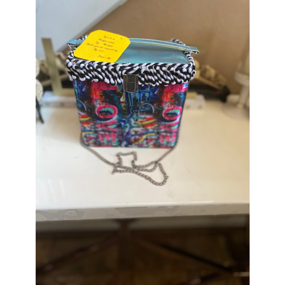 ONE OF A KIND HANDBAG, PURPLE, AND COLORFUL SIDES.